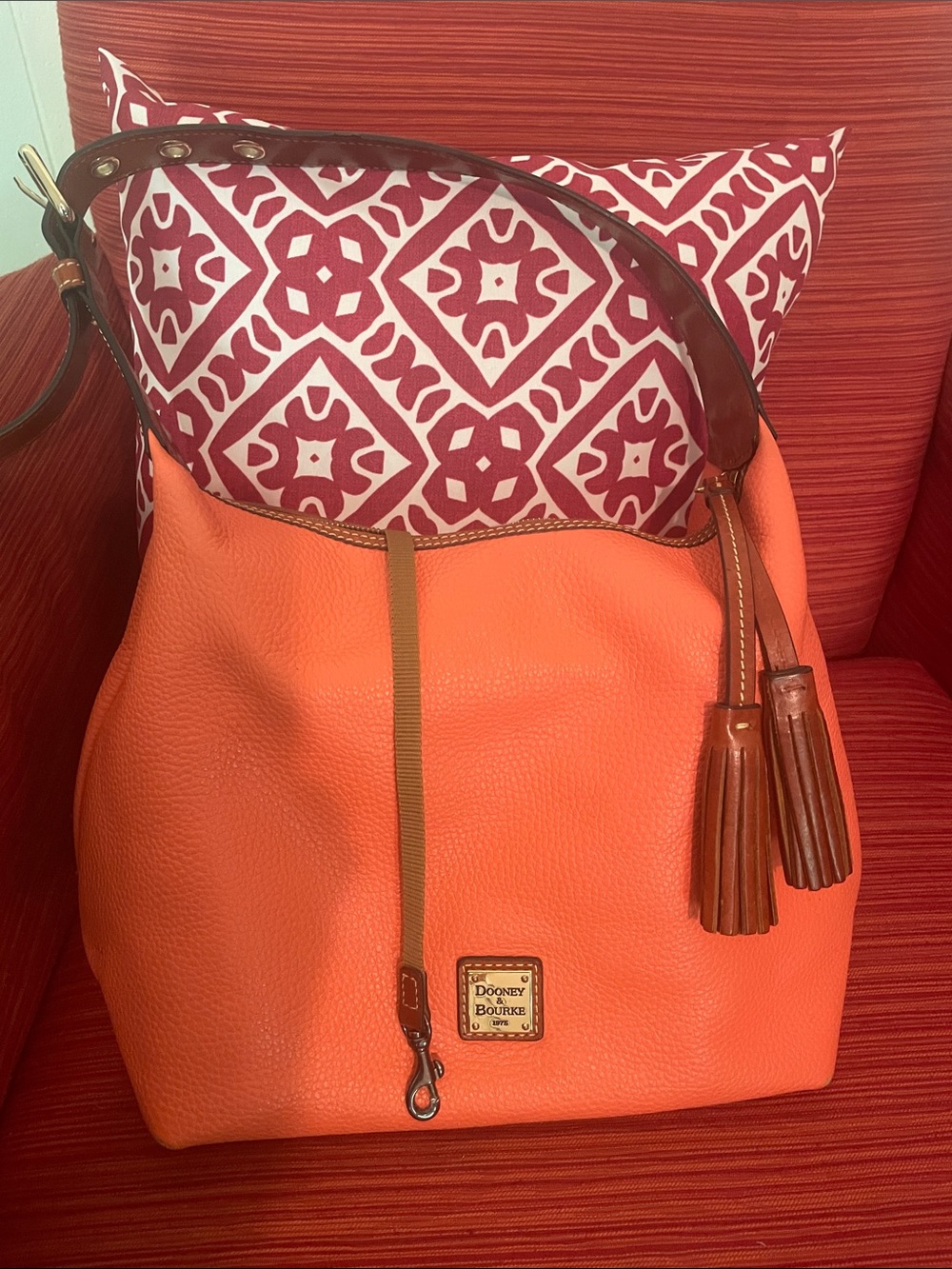 Dooney & Bourke Bright Orange Pebble Leather Hobo with Brown Accents